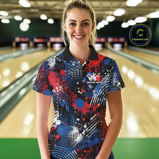 Smiling woman wearing a custom red, white, and blue patriotic eagle bowling shirt inside a bowling alley