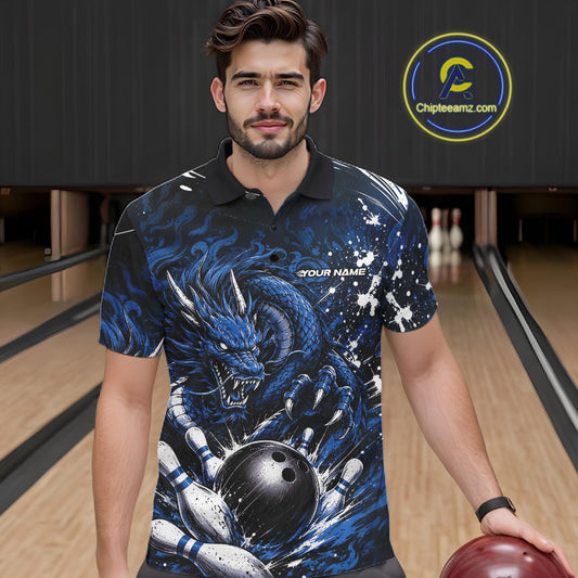Man wearing a blue dragon-themed bowling shirt in a bowling alley.