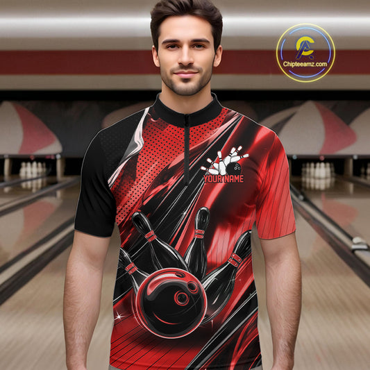 Male model wearing a black and red bowling quarter-zip shirt at the lane with dynamic bowling ball and pin artwork.