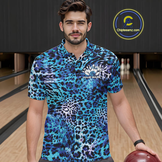 A man stands in a bowling alley wearing a yellow, brown, and black leopard-print bowling shirt with a bowling pin graphic and “Your Name” on the chest.