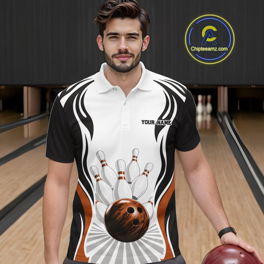 Front view of a male model wearing a white, black, and orange bowling polo shirt with bowling ball hitting the pins artwork at a bowling lane.