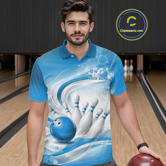 Male model standing in a bowling lane wearing a white and blue bowling polo shirt featuring abstract wave lines and a glossy bowling ball striking pins on the front.