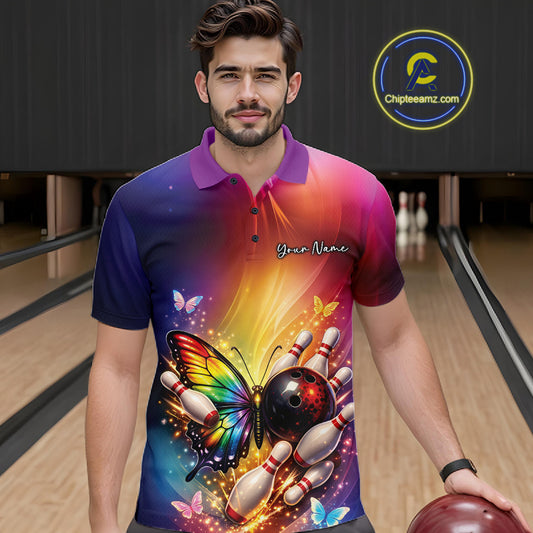 Male model wearing a bowling polo shirt at a bowling lane with a rainbow butterfly, bowling ball, and scattered pin artwork.