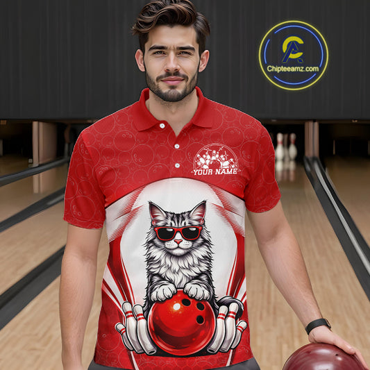 Male model at a bowling lane wearing a bowling polo shirt with a Maine Coon cat in sunglasses beside a bowling ball.