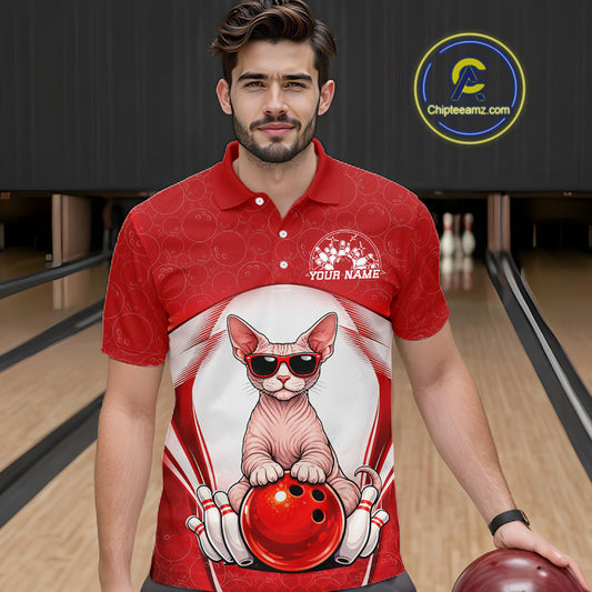 Male model at a bowling lane wearing a bowling polo shirt with a sphynx cat in sunglasses resting against a bowling ball.