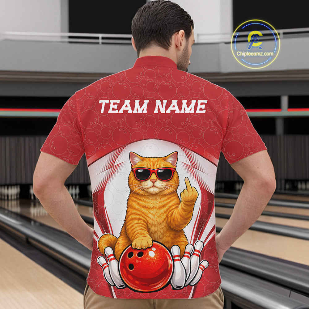Front view of a male model in a bowling venue wearing a quarter-zip shirt showcasing a cool British Shorthair cat in sunglasses beside a bowling ball.