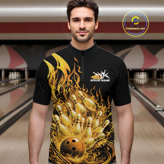 Male model in bowling lane wearing quarter-zip shirt with flaming bowling ball striking pins yellow flame sports graphics