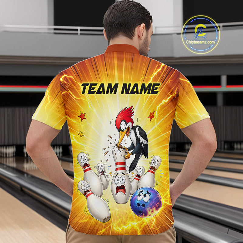Man wearing a colorful bowling-themed shirt with cartoon characters in an indoor bowling alley.