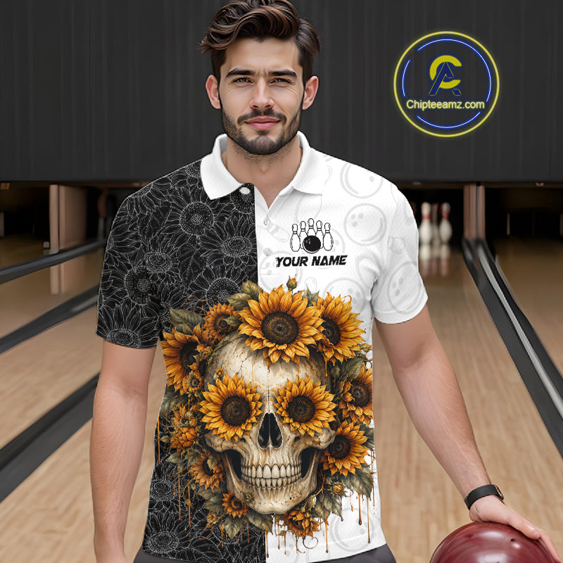 Man wearing a white polo shirt with a sunflower skull design in a bowling alley.