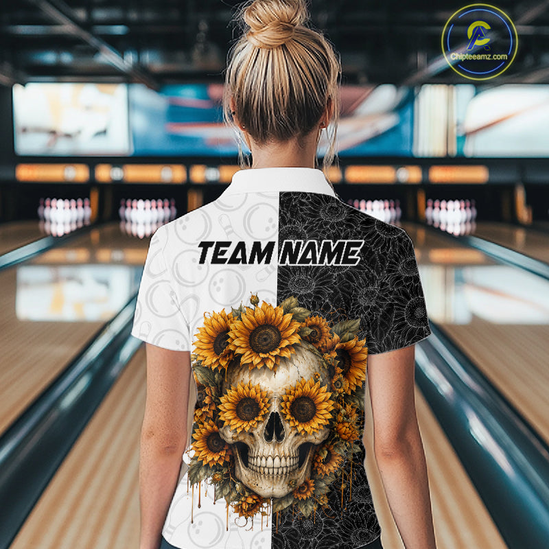 Person wearing a shirt with a skull and sunflower design in a bowling alley.