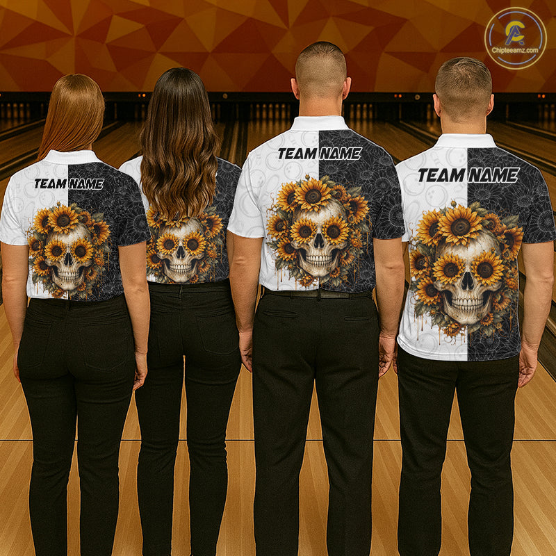 Four people wearing bowling shirts with skull and sunflower designs on a bowling alley.
