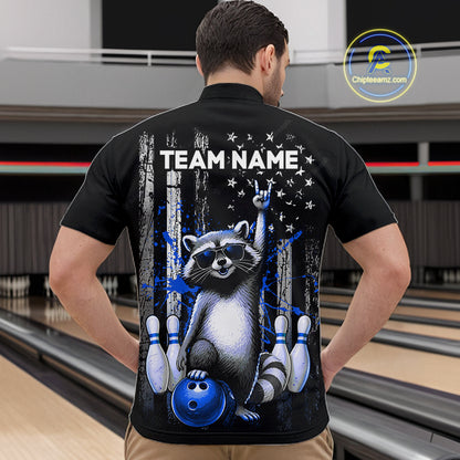 Person wearing a black shirt with a raccoon graphic and 'TEAM NAME' text in a bowling alley.