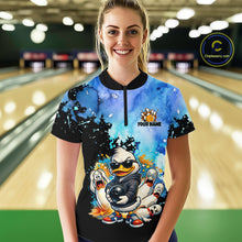 Load image into Gallery viewer, Person wearing a colorful bowling shirt with cartoon characters in a bowling alley.