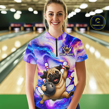 Load image into Gallery viewer, Woman wearing a colorful bowling-themed shirt with a pug design in a bowling alley.
