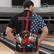 Load image into Gallery viewer, Person wearing a black shirt with a graphic design of a dachshund bowling, American flag, and 'Team Name' text in a bowling alley.