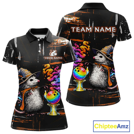 Custom short-sleeve polo shirt shown from the front and back on a white background. The shirt features a black base with a colorful graphic print of two opossums wearing witch hats, bowling balls, and swirling rainbow smoke, with customizable text placeholders 'TEAM NAME' and 'YOUR NAME'.