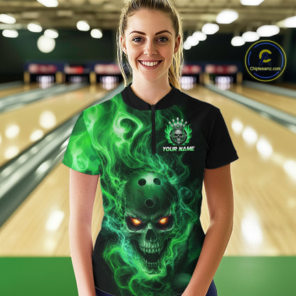 Women wearing a black bowling quarter zip shirt featuring a flaming skull with glowing orange eyes, green smoke effects, and custom “YOUR NAME” text.