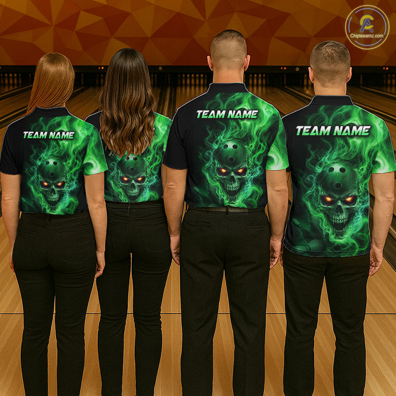 Four people wearing a black bowling quarter zip shirt featuring a flaming skull with glowing orange eyes, green smoke effects, and custom “TEAM NAME” text.