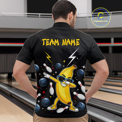 Man wearing a black bowling polo with a banana character and 'Team Name' text in a bowling alley.