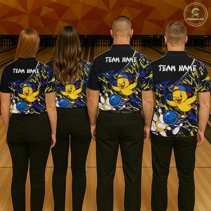 Four people wearing matching bowling shirts with a duck and ball design on a bowling alley.