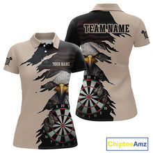 Load image into Gallery viewer, Front and back views of a beige and black darts polo featuring a bald eagle, torn-flag graphics, dartboard designs, and custom team text.
