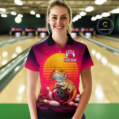 Women’s retro sunset bearded dragon bowling polo shirt, front view on female model in bowling lane 
