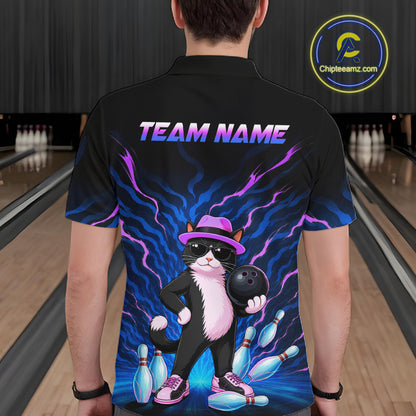 A person shown from the back wearing a black short-sleeve bowling-themed shirt with a colorful graphic of a cat in a hat holding a bowling ball, surrounded by bowling pins and blue lightning effects. The shirt has 'TEAM NAME' printed across the upper back.