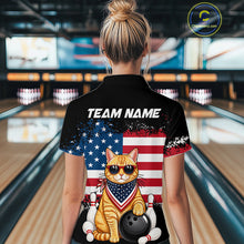 Load image into Gallery viewer, Women’s us flag cat bowling polo shirt, back view on female model in bowling lane 