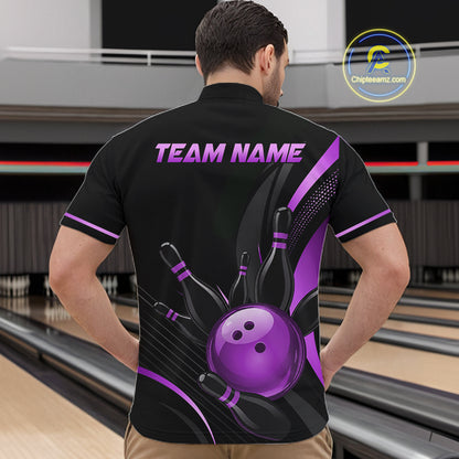 Person wearing a black and purple bowling shirt with 'TEAM NAME' on the back, standing in a bowling alley.