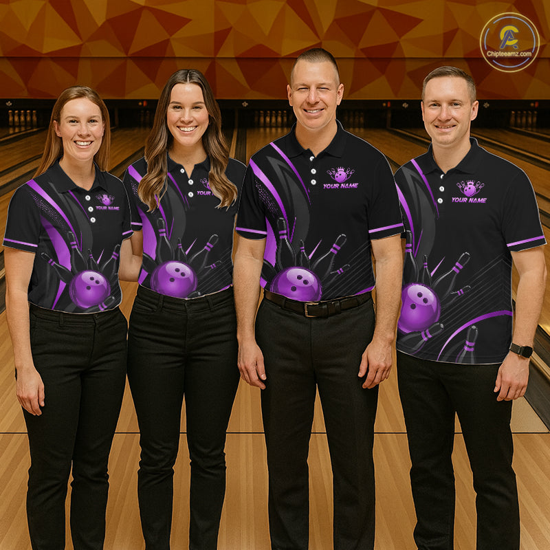Four people wearing matching bowling shirts on a bowling alley.