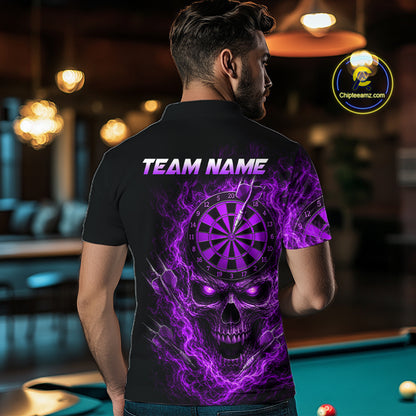 A man viewed from behind wearing a black short-sleeve polo shirt with a large purple and black skull graphic, a dartboard motif, and the text 'TEAM NAME' across the upper back. The shirt is shown in a dimly lit pool hall environment, with a circular 'ChipteeAmz'.