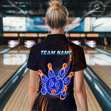 Load image into Gallery viewer, Woman wearing of a black bowling quarter zip shirt with neon blue and orange cartoon bowling ball and pin graphics, plus custom team name text.