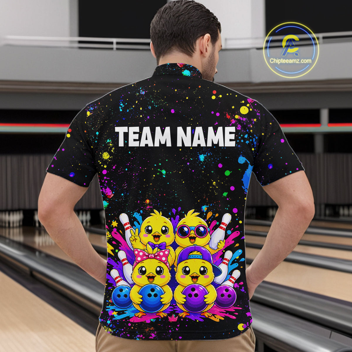 Men wearing personalized bowling quarter zip shirt with cartoon chicks holding bowling balls, framed by pins and colorful paint patterns on a black layout.