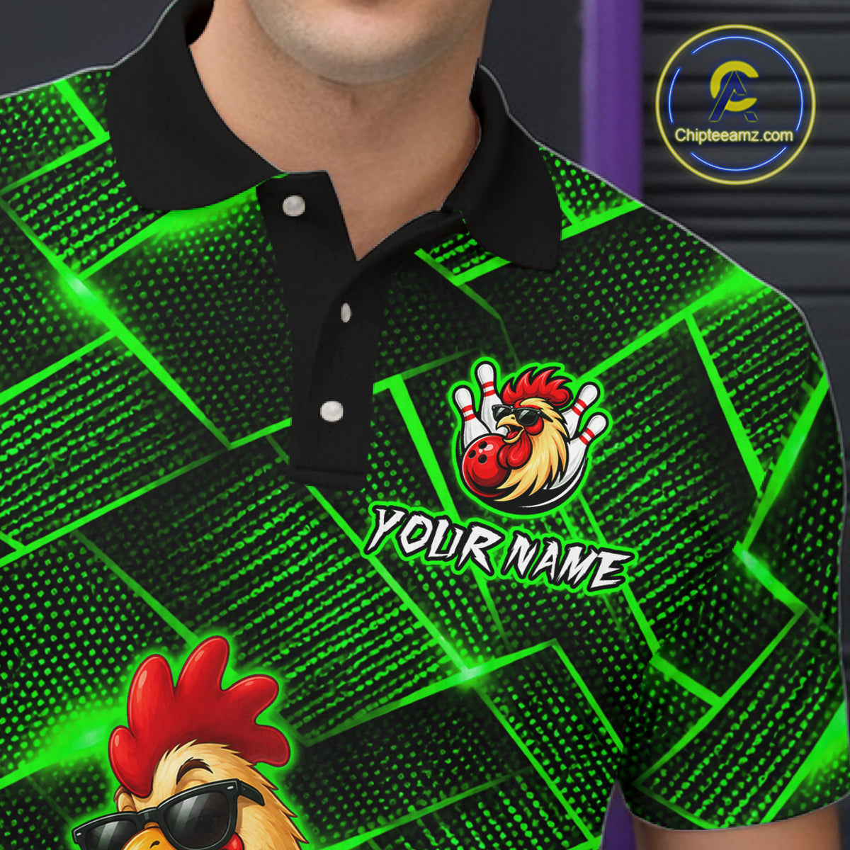 Green and black patterned shirt with a rooster logo and 'Your Name' text, featuring a brand logo in the corner.