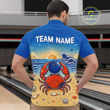 Load image into Gallery viewer, Man wearing a blue shirt with a colorful design of a crab holding a bowling ball on a beach, with 'TEAM NAME' text.