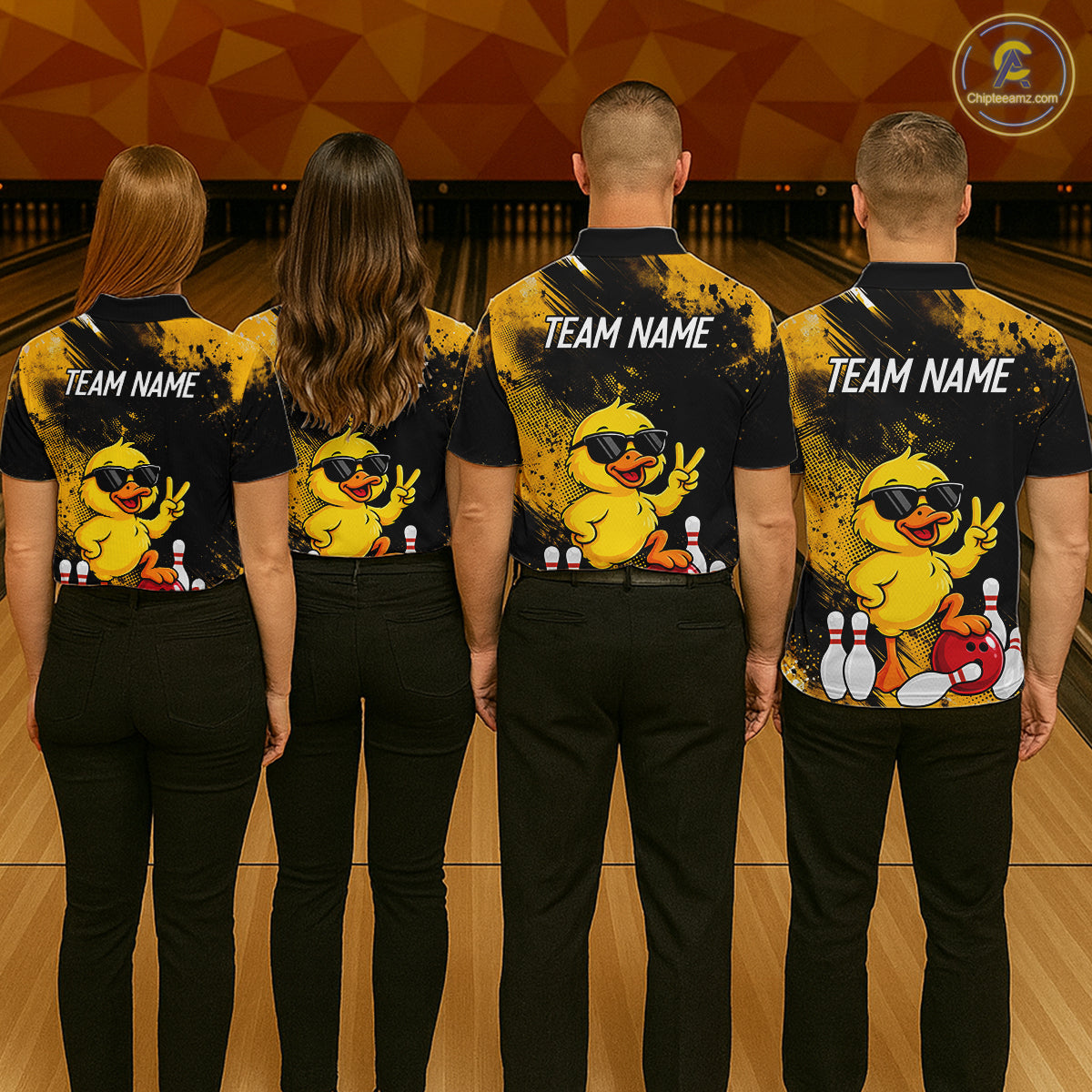 Four people standing with their backs to the camera in a bowling alley, wearing matching black and yellow bowling-themed shirts with a cartoon duck graphic and customizable text 'TEAM NAME'.