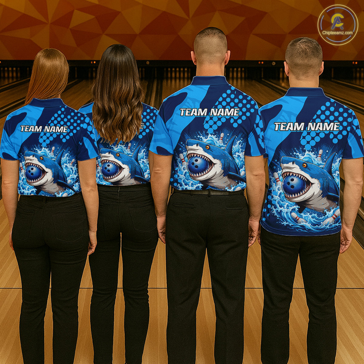 Four people wearing blue bowling shirts with shark graphics and 'Team Name' text in a bowling alley.