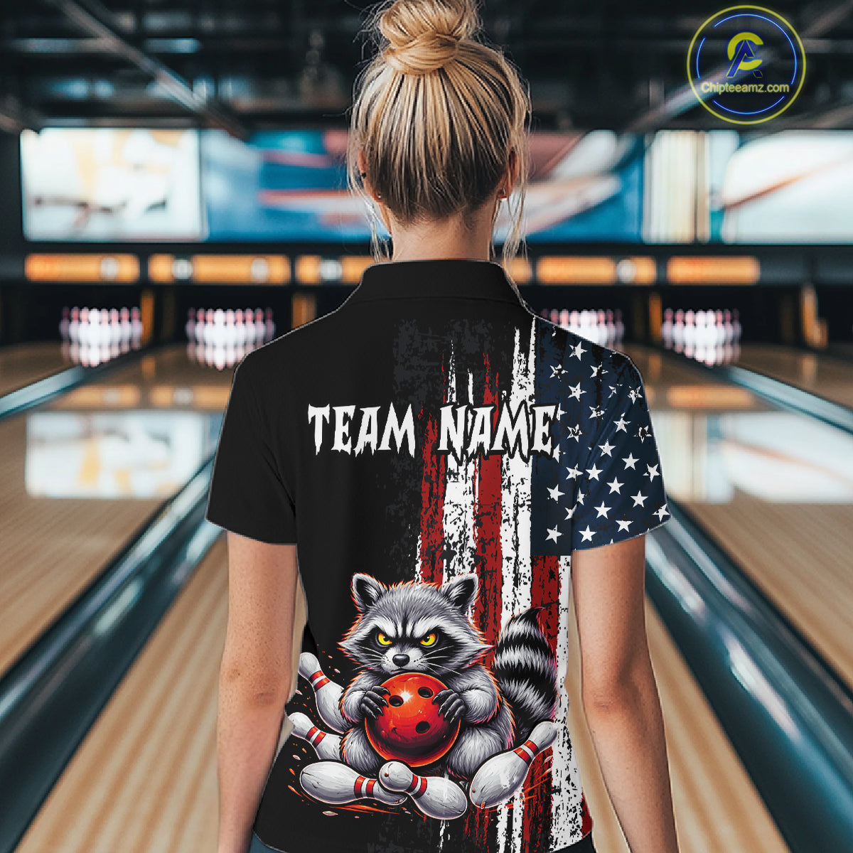 Women’s us flag raccoon bowling quarter zip shirt, back view on female model in bowling lane 