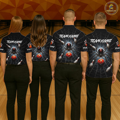 Four people standing from the back in a bowling alley, wearing matching black short-sleeve shirts with a large spider and bowling pin graphic on the back, plus white 'TEAM NAME' text across the shoulders.