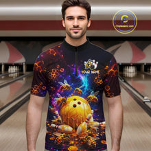 Load image into Gallery viewer, Man wearing a colorful bowling jersey with a design of a bowling ball and bees in a bowling alley.