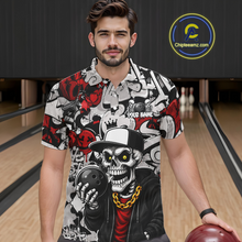 Load image into Gallery viewer, Man wearing a graphic shirt with a skeleton design holding a bowling ball in a bowling alley.