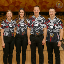 Load image into Gallery viewer, Four people wearing matching shirts with a skull design in a bowling alley.