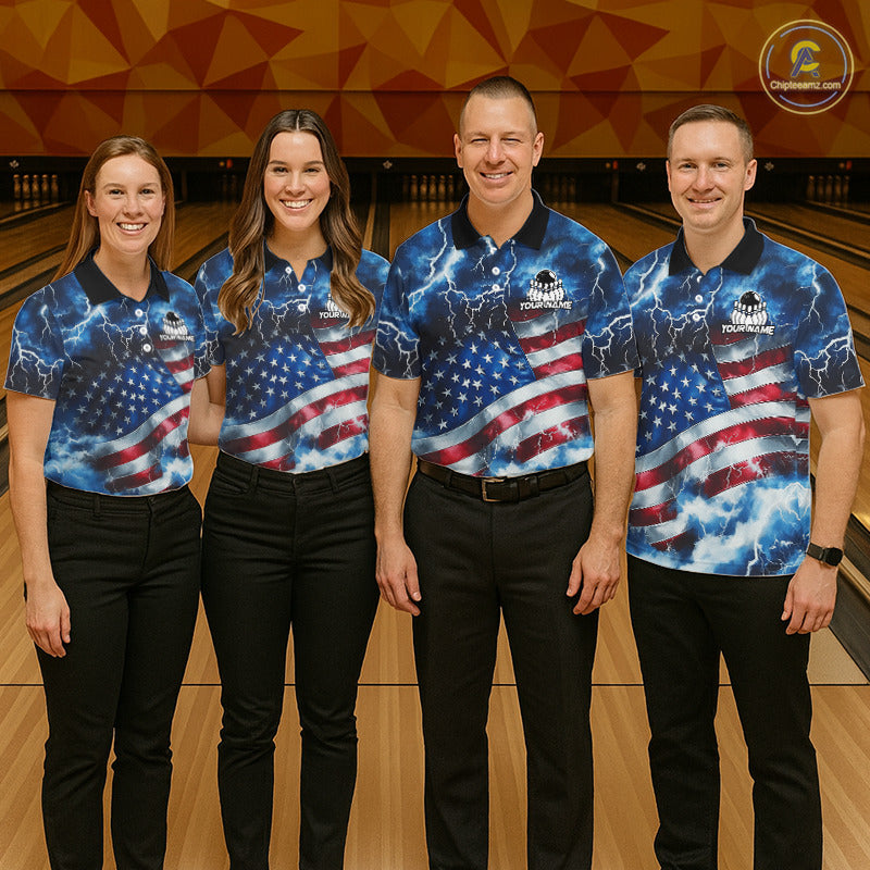 Four people standing together in a bowling alley wearing matching blue, red, and white patriotic lightning-themed bowling shirts and black pants.