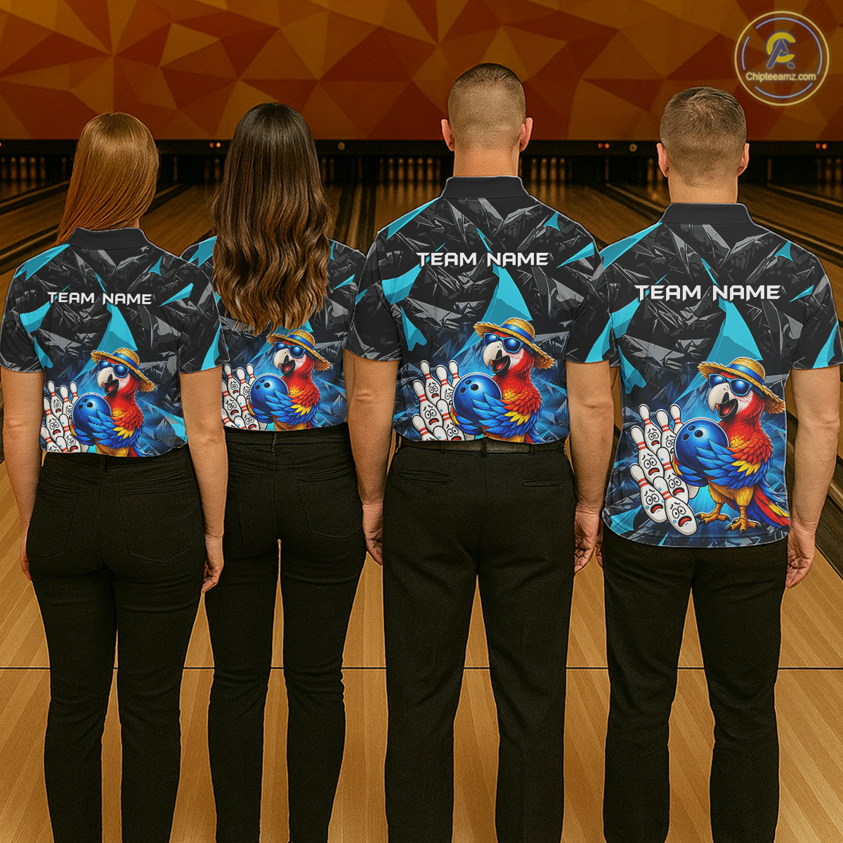 Four people wearing matching bowling shirts with colorful parrot designs on a bowling alley.