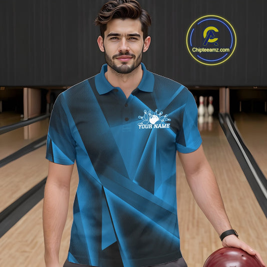 Man in a blue bowling shirt with a logo on a bowling alley background