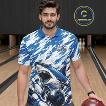 Load image into Gallery viewer, Man wearing a blue and white polo shirt with a shark design in a bowling alley.