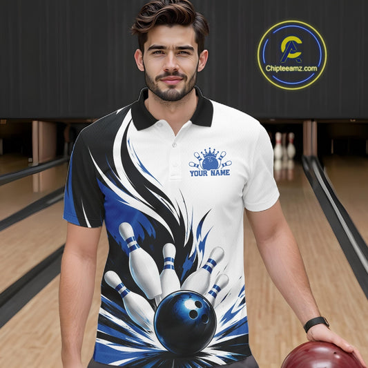 Front view of a male model wearing a white, black, and blue bowling polo shirt showcasing a flaming bowling ball striking pins graphic in a bowling lane.