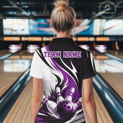 Back view of a female model wearing a white, black, and purple bowling quarter zip shirt featuring a flaming bowling ball striking pins in a bowling lane.