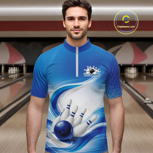 White and blue bowling quarter-zip shirt on a male model, featuring elegant wave accents and a bowling ball striking the pins