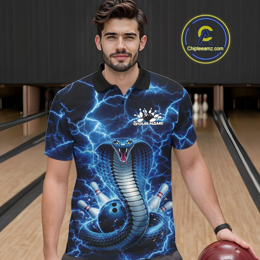 Male model wearing a bowling polo in a bowling alley with blue cobra graphics and lightning-themed bowling artwork.